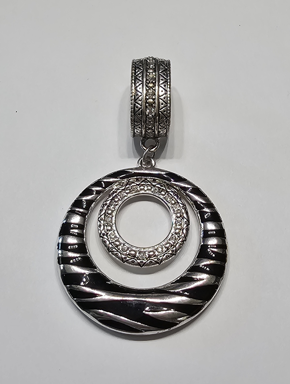 Ornate Silver Tone Double Circle Pendant with Black Enamel Inlay